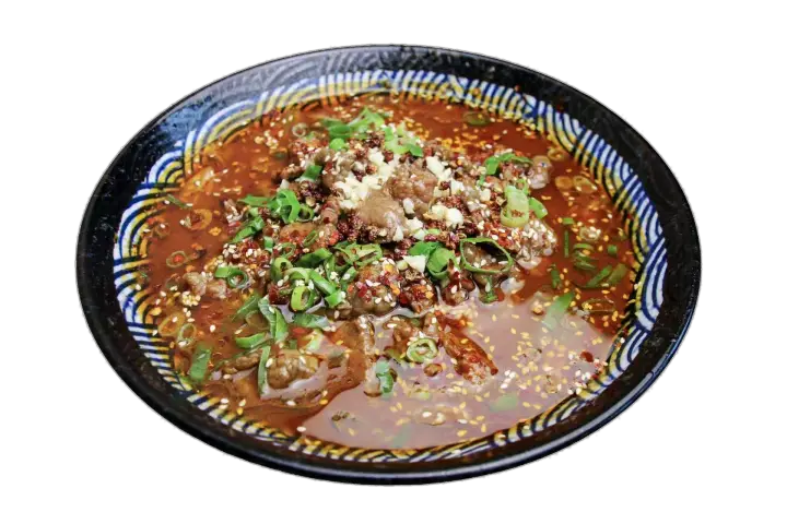Sichuan-style spicy soup pot with fish, beef, or pork slices, vegetables, chili oil, garlic, and sesame.